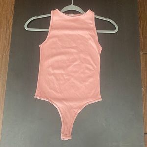 Fitted dusty pink bodysuit. One size
